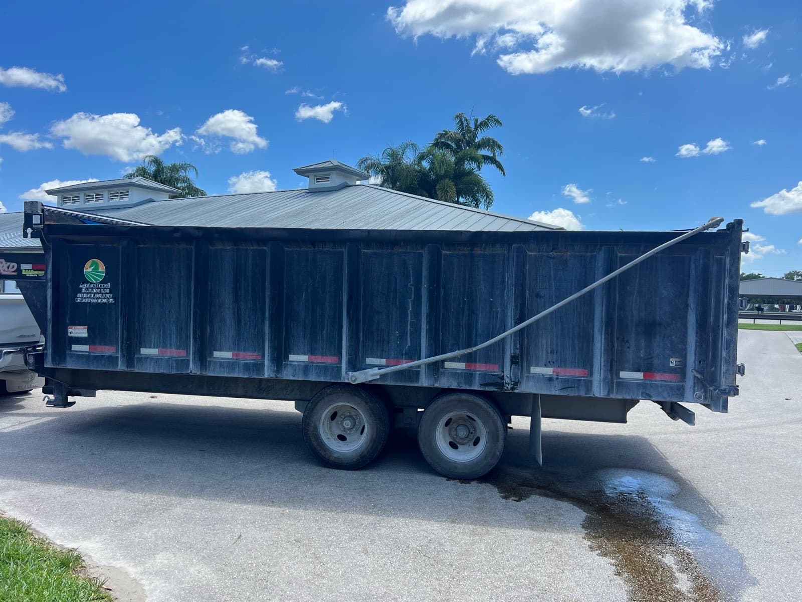 Roll-off dumpster at customer property